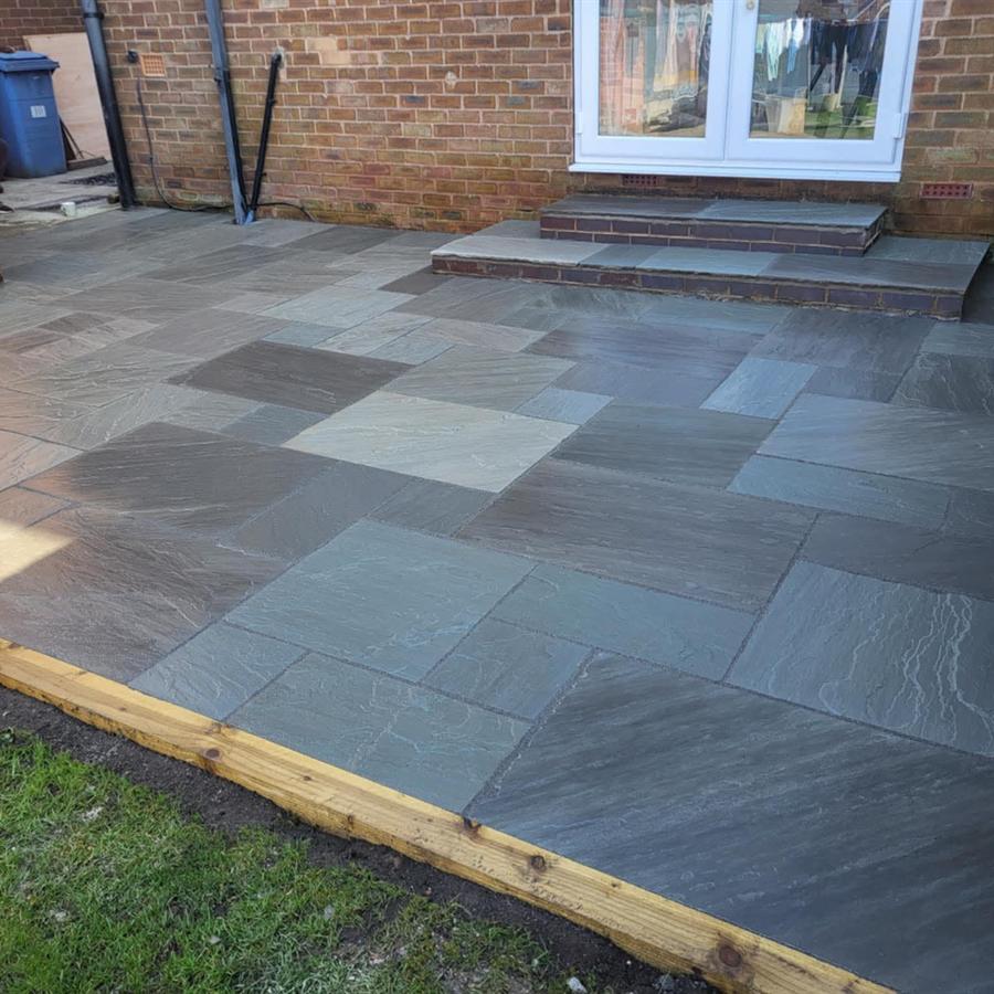 Grey sandstone patio with steps