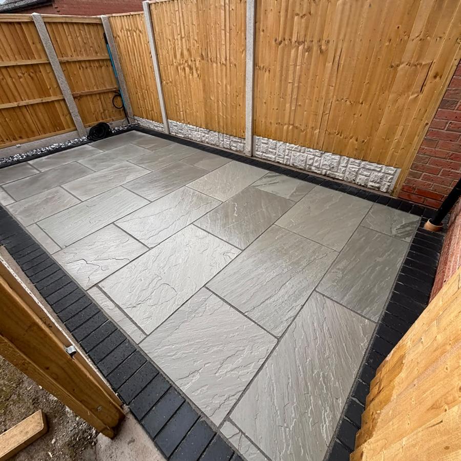 Raised patio with charcoal edging